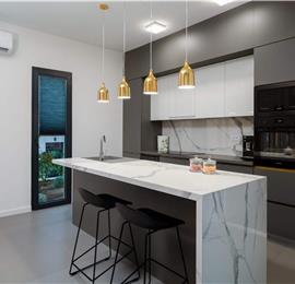 Luxury Beachfront Villa with Heated Infinity Pool near Trogir, Sleeps 8